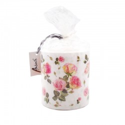Bougie cylindrique 35h décor roses présentée dans son pochon cadeau