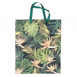 Sac cadeau décor feuilles tropicales et fleurs avec reflets cuivrés vu de face