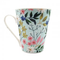 Mug porcelaine par Kiub décor printanier de fleurs stylisées sur fond vert clair